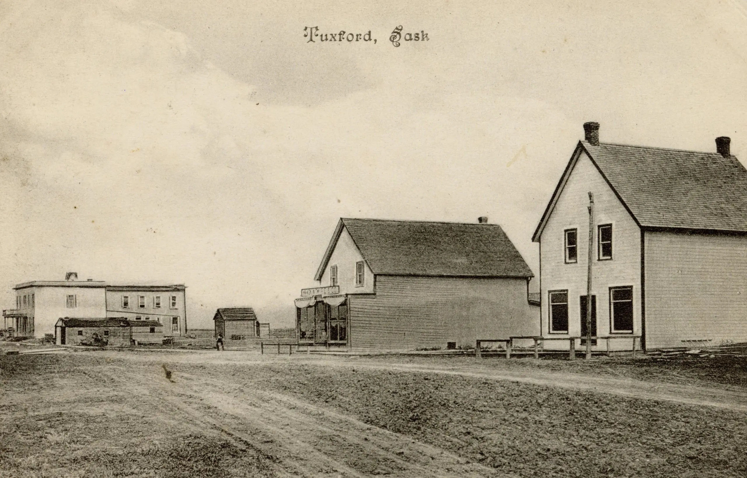 Early street scene with wooden buildings
